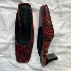A. Marinelli snakeskin mules